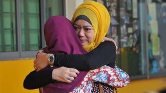 Relatives of students from Singapore caught up in the Malaysia mountain quake, 7 June 2015