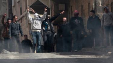 Anti-government protesters on the streets of the Syrian city of Deraa on 23 March 2011