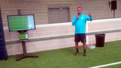 Manchester City coach Simon Davies using SAP technology