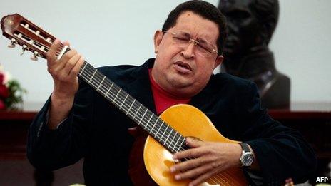 Hugo Chavez playing his guitar