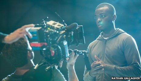 George the Poet on set in east London