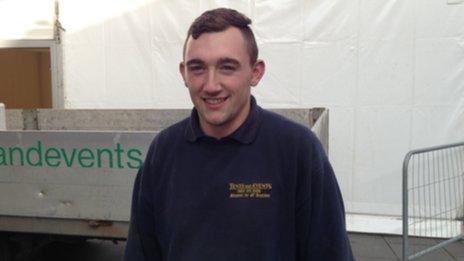 Chris Smith, 22, rigging a marquee for the conference organisers