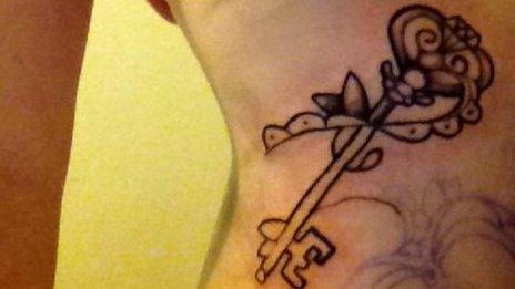 Maggy tattoo of a key