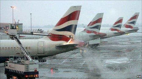 Aeroplanes at Heathrow being de-iced