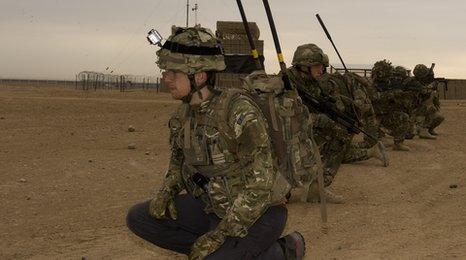Greg James with troops