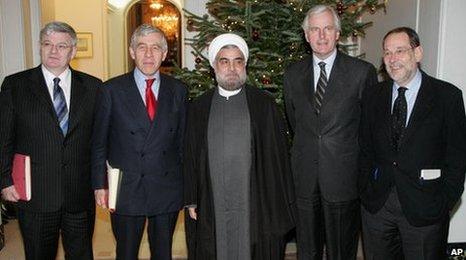 Jack Straw (2nd left) and Hassan Rouhani (centre) in December 2004