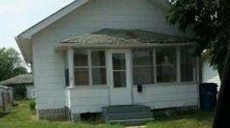 House with figure at the window