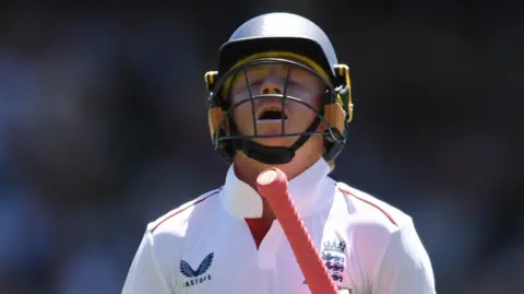 England batter Ollie Pope looks dejected as he walks off after being dismissed