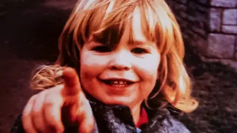 Luke O'Shea-Phillips as a young child