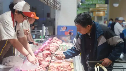 A consumer at supermarket in China.