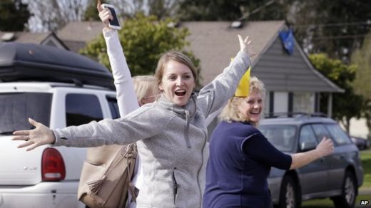 Supporters of Amanda Knox leave her mother's home looking happy