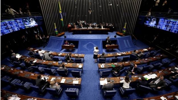 Members of Brazil's Senate, in favour and against the impeachment of President Dilma Rousseff, participate in the debate leading up to the voting in Brasilia, Brazil, May 11, 2016