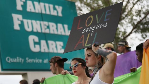 People support mourners of gun attack victim Javier Jorge-Reyes in Orlando, Florida. 15 June 2016