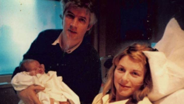 James with his parents when he was born