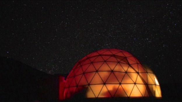 File picture of the HI-SEAS dome in Hawaii lit up a night.