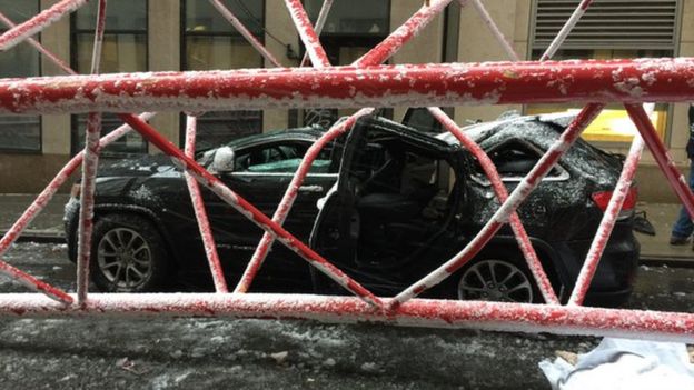 Damaged car from collapsed crane