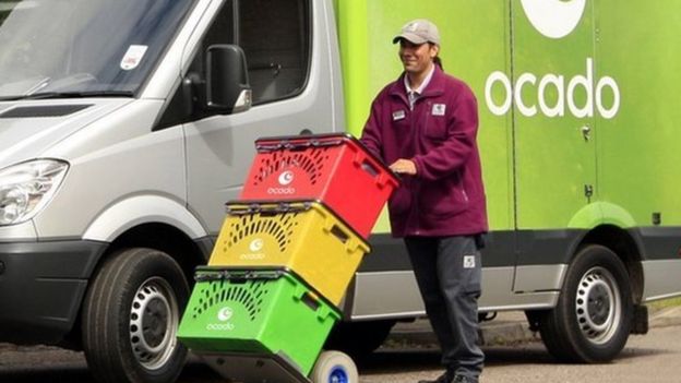 Ocado delivery man with boxes and van