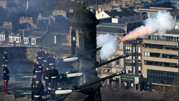 Members of the 29 Commando Regiment Royal Artillery fire a 21-gun salute at Edinburgh Castle