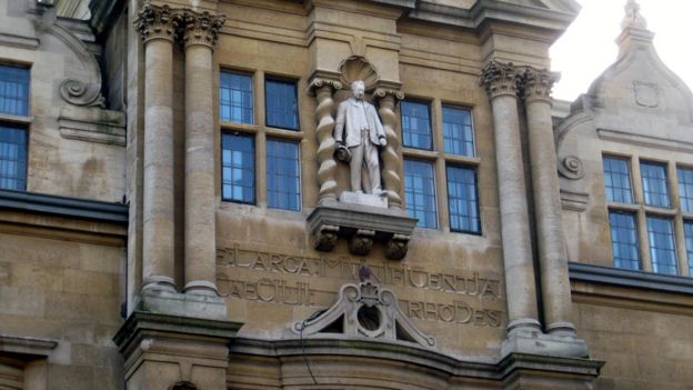 Rhodes's statue stands on the building named after him at Oriel College, Oxford