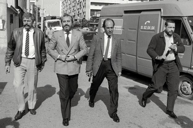 Judge Giovanni Falcone (second from left) with bodyguards in Marseilles, investigating the Mafia's international links