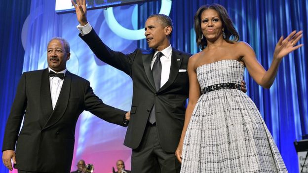 The former congressman shares a stage with the Obamas during a 2013 event in Philadelphia