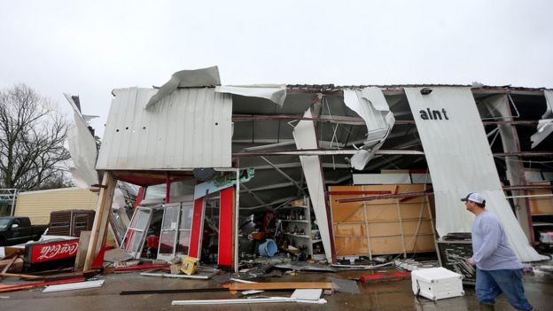 A hardware store is destroyed near the intersection of Routes 70 and 1 Tuesday, Feb. 23, 2016, in Paincourtville, La