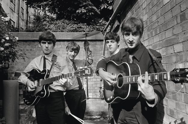 The Beatles in the backyard of the Abbey Road Studios, in London in the early 1960s