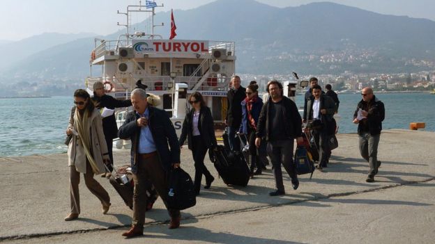 Turkish delegation of observers arrives at port of Mytilene on Greek island of Lesbos (21 March)