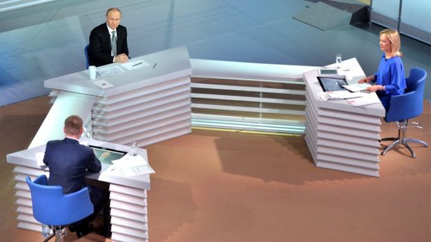 Russian President Vladimir Putin attends a live broadcast nationwide call-in in Moscow, Russia, April 14, 201