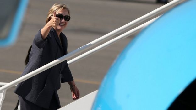 Hillary Clinton boards a plane in New York