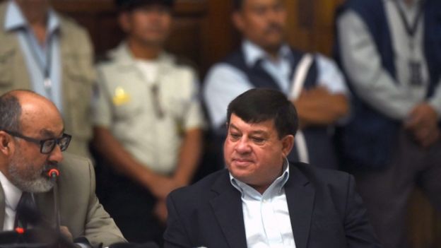 Former army officer Steelier Francisco Reyes Giron (R), accused of keeping 11 indigenous women as sex slaves during the country's bloody 36-year civil war, during his trial's hearing, in Guatemala City on February 1, 2016