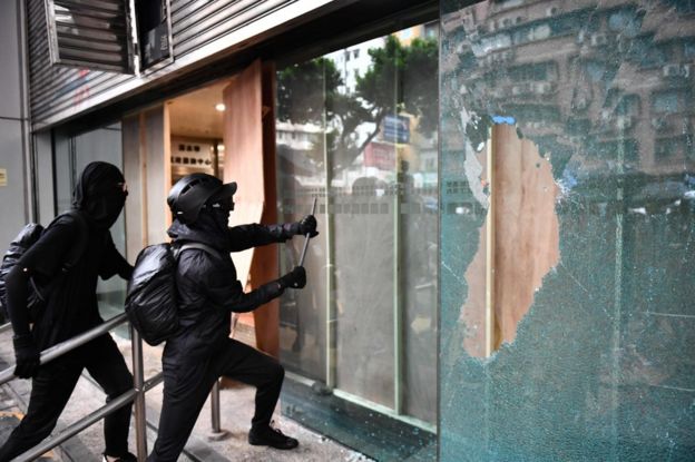 Protesters vandalise the Cheung Sha Wan local government offices during a demonstration in Hong Kong on October 6, 2019