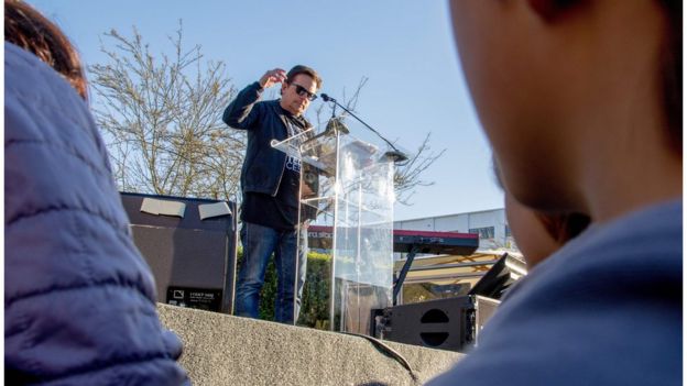 Actor Michael J. Fox speaks at the United Voices Rally outside the United Talent Agency in Beverly Hills, California on February 24, 2017.