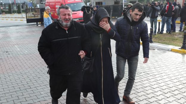 Relatives of victims arrive in front of the forensic medicine institute where people gathered to mourn after a gun attack on Reina, a popular night club in Istanbul near by the Bosphorus, in Istanbul, Turkey, early morning 01 January 2017