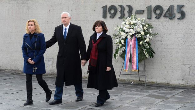 US Vice-President Mike Pence (C), his wife Karen Pence (R) and his daughter Charlotte Pence after laying a wreath at the former Nazi death camp of Dachau, Germany (February 19, 2017)