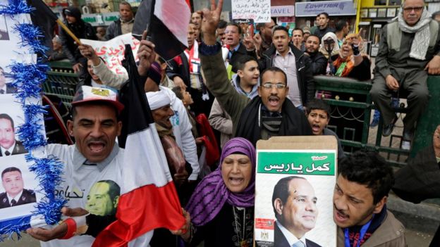 Supporters of President Abdul Fattah al-Sisi celebrate Police Day in Cairo's Tahrir Square on 25 January 2016