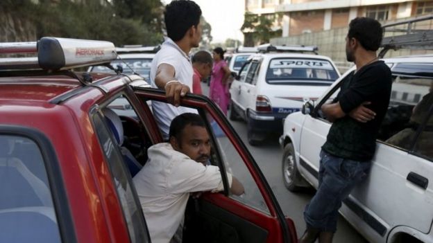 Drivers wait in a queue near a petrol station in Kathmandu. Photo: 1 October 2015