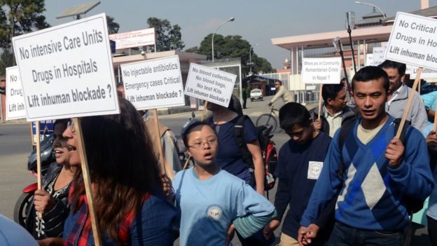 Nepalese activists and hospital patients rally against the block on humanitarian supplies at the Nepal-India border, in Kathmandu on November 23, 2015