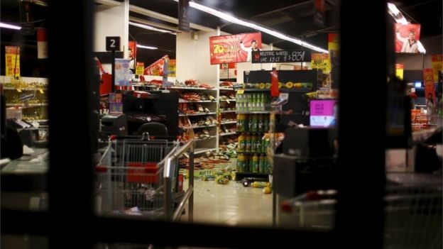 Bottles lie on the the ground in a shop after an earthquake hit areas of central Chile, in Illapel town, north of Santiago, Chile, September 17, 2015