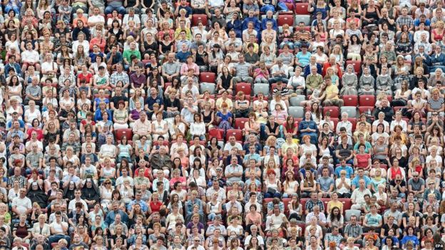 Believers pack the stadium during the 