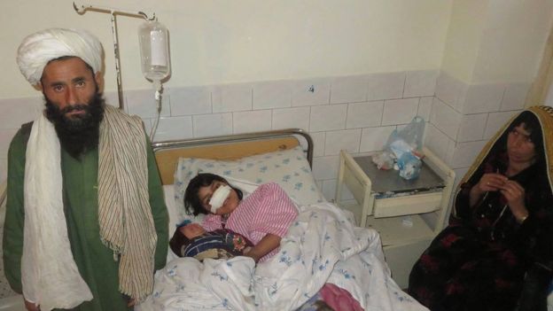 Reza Gul with her baby, mother and father in Maimana hospital