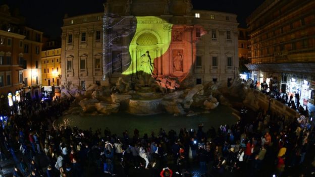 Rome's Trevi fountain lit up in the colours of the Belgian flag