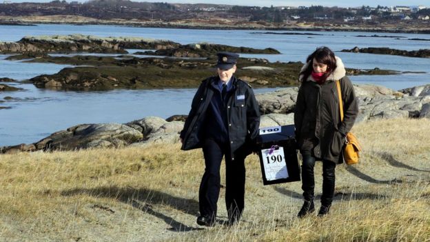 A police officer and a presiding officer arrive on the island of Inishfree, off the west coast of Ireland, with a ballot box for the Irish general election