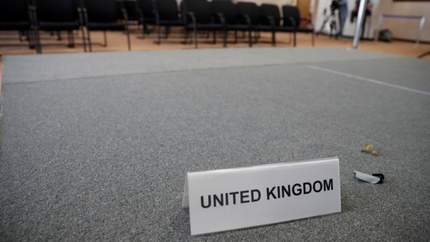 A United Kingdom name card lies on a stage inside the empty British press conference room on the second day of the EU Summit in Brussels, Belgium June 29, 2016.