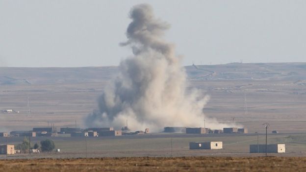 Explosion after an air strike by a US-led coalition warplane on an Islamic State position near al-Hawl, Syria (10 November 2015)