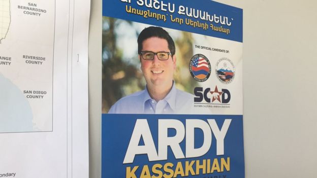 An Armenian-language Ardy Kassakhian sign hangs in his campaign headquarters.