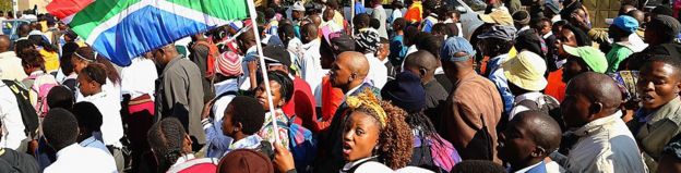 Woman waves South African flag at youth day even in 2013