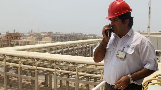 A worker speaks on his walkie-talkie at the South Pars gas field in the southern Iranian port of Asaluyeh