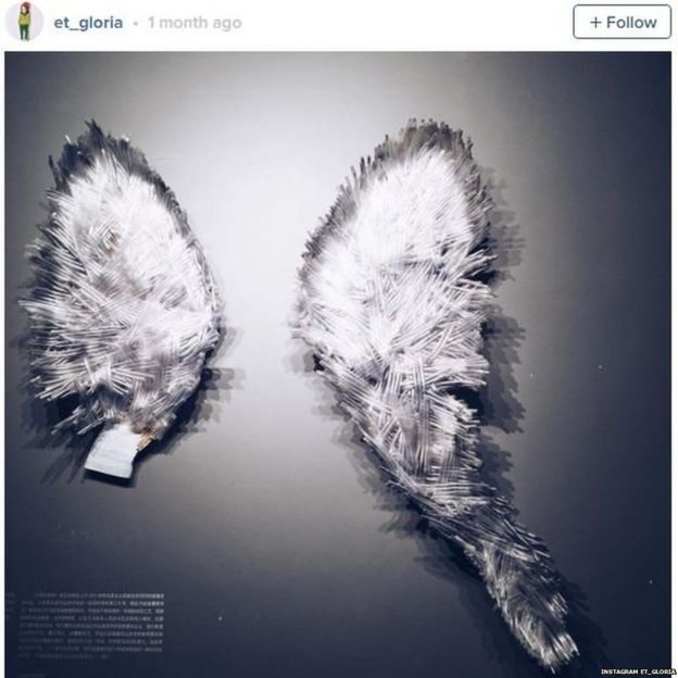 Black and white photo of angel wings renamed 'Broken' after the wings got smashed by visitors to the Shanghai Museum of Glass.