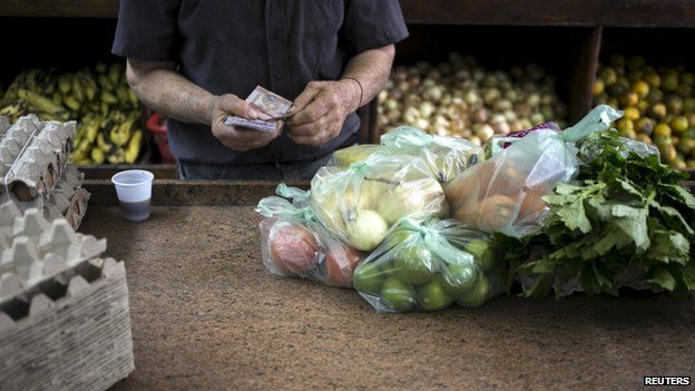 Clerk in Venezuelan shop